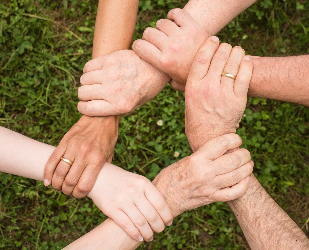 Family holding hands, after Dietitian and Nutritionist consultation in melbourne, Victoria.jpg